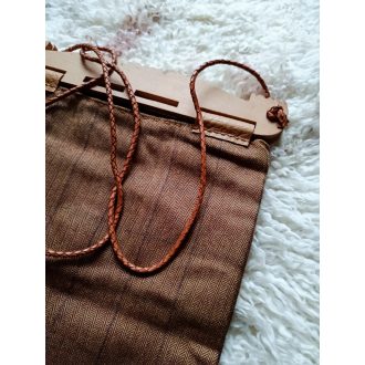 Hedeby wooden part, fabric bag, braided leather cord