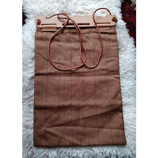 Hedeby wooden part, fabric bag, braided leather cord