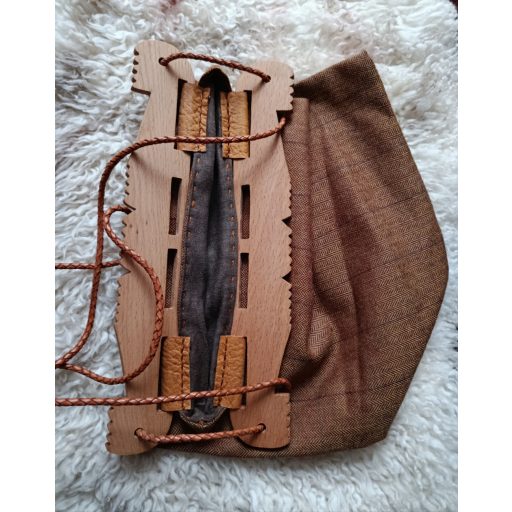 Hedeby wooden part, fabric bag, braided leather cord