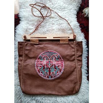   Hedeby wooden part, leather,  brokate silk inlay, braided leather cord