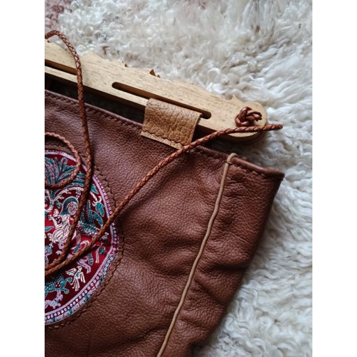 Hedeby wooden part, leather,  brokate silk inlay, braided leather cord